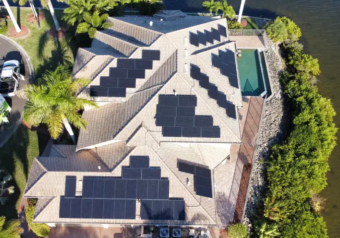 An aerial shot of a Central Florida home after recent Solar Panel Removal & Replacement from Prime Vision Renovations
